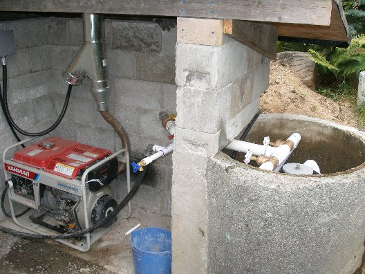 A 3 kW diesel generator back up sits next to the hydro turbine.